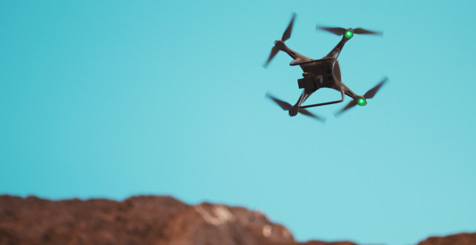 Drone in blue sky